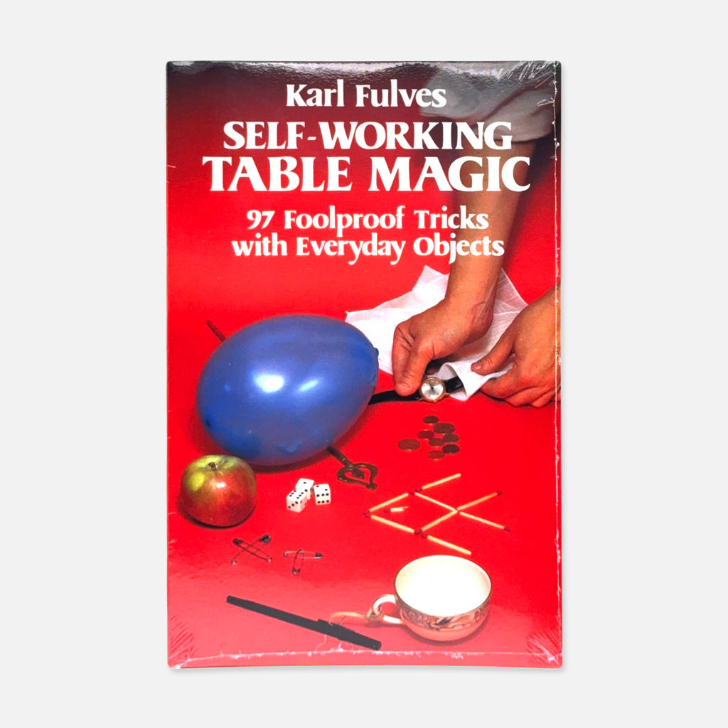 Cover of "Self-Working Table Magic" by Karl Fulves, featuring 97 easy magic effects with everyday objects, brand-new paperback edition